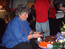 Joan Cutting More Cake