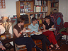 Three Women Sitting with Legs Crossed